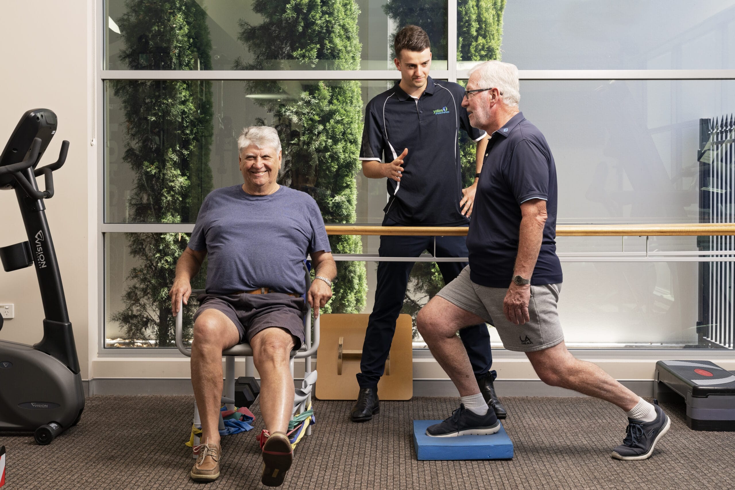 A group of participants engaged in a GLA:D exercise session led by a physiotherapist at Yates Physiotherapy, Adelaide